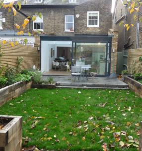 Rear elevation of single storey extension and garden