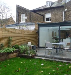 Rear elevation of single storey elevation and patio