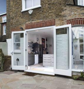 New French Doors and full height window to the Rear Elevation